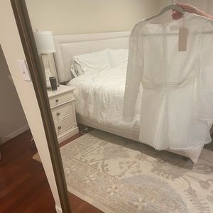 Brand new white romper from Keepsake